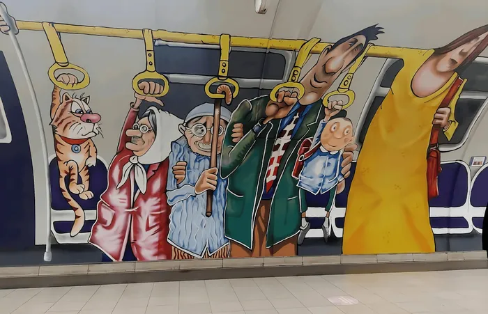 Metro istasyonunda karikatür yolcular duvar resmi